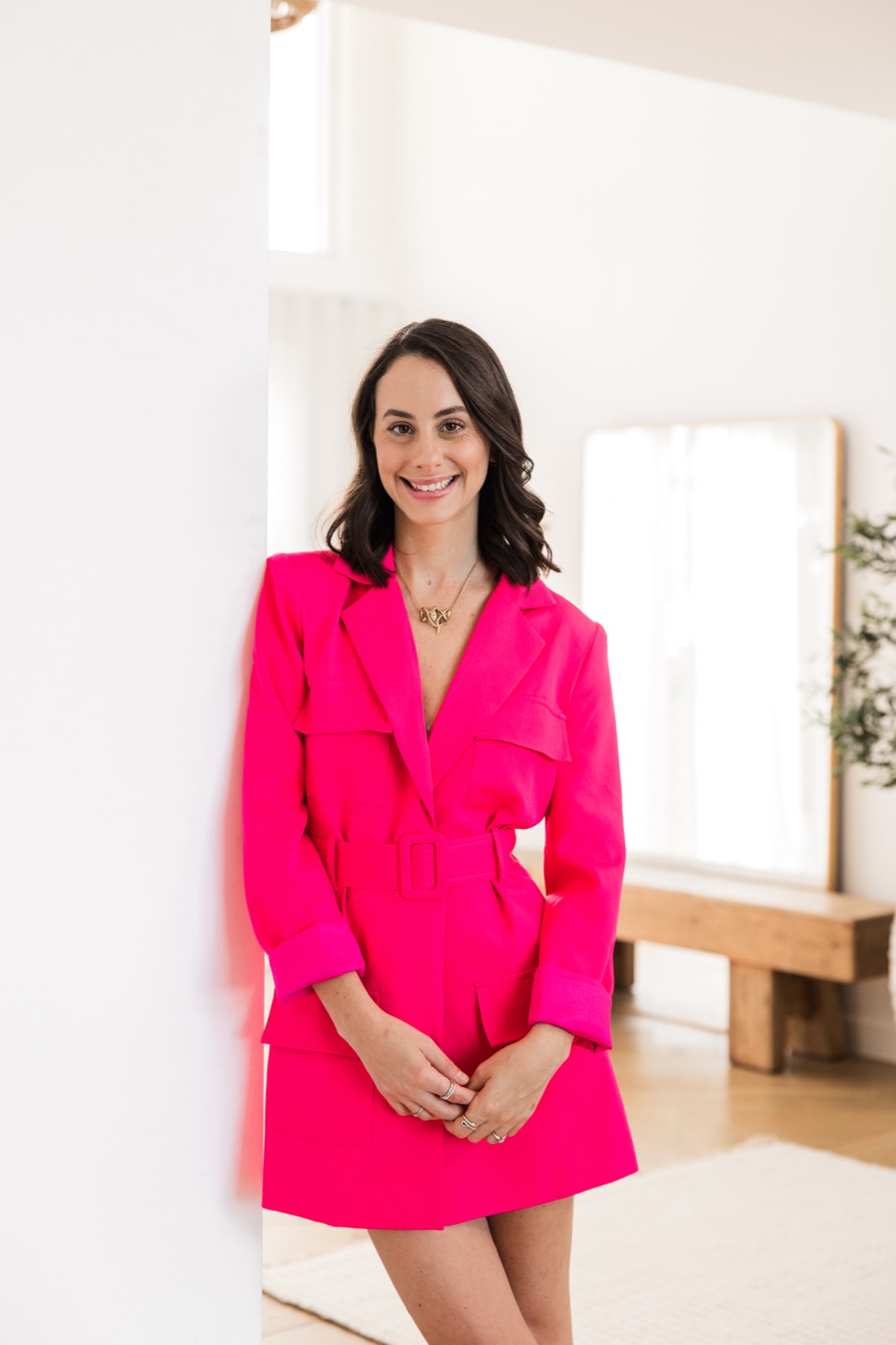 Gabi Saper in a hot pink blazer